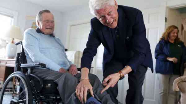 Partisan divide grows sharper in US, but Bush-Clinton friendship endures