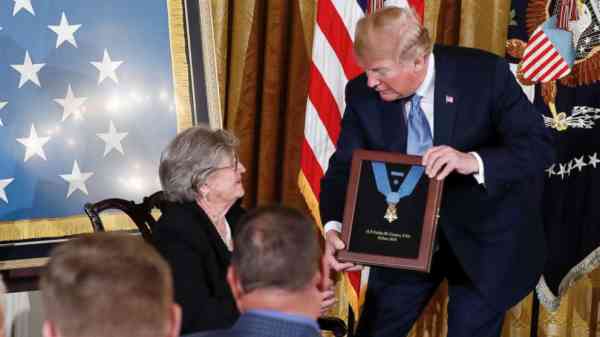 Widow accepts Medal of Honor on behalf of WWII hero husband 