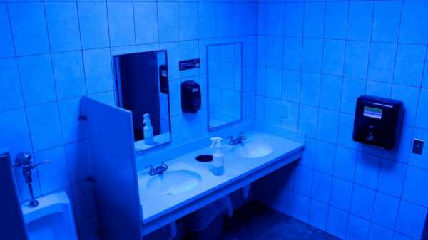Retailers experiment with blue lights to deter drug use