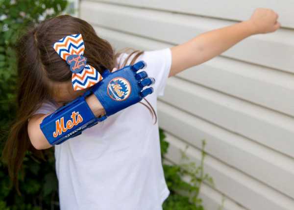 Girl with 3-D printed hand nears goal of throwing out first pitch at all 30 MLB parks