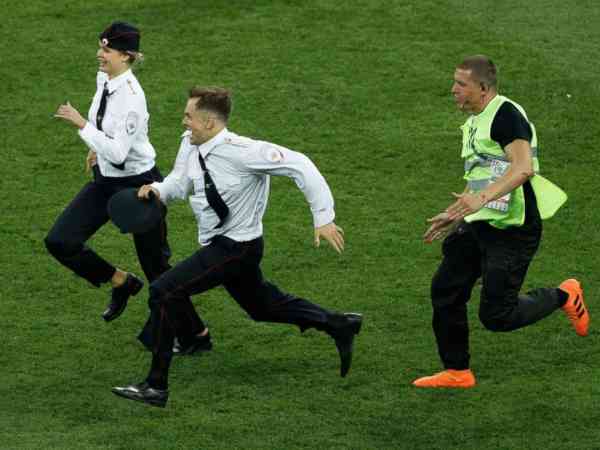 Pussy Riot claims responsibility for dramatic on-field protest during World Cup final