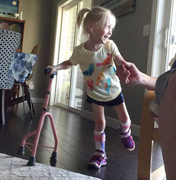 4-year-old with cerebral palsy celebrates after taking first independent steps