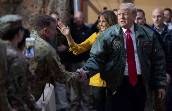 Trump gets political speaking to troops, talking border wall and leaving Syria