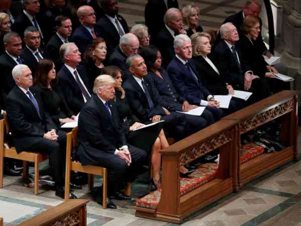 Trumps get frosty reception from Obamas, Clintons at George H.W. Bush funeral