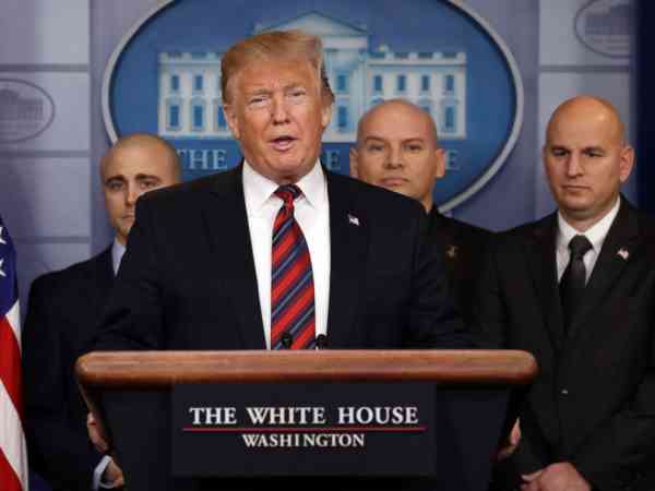 Trump makes surprise appearance in briefing room to call for border wall