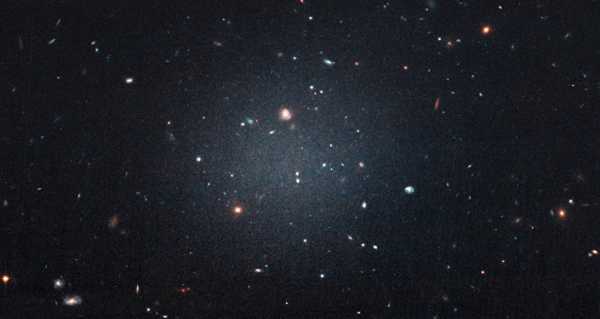 Dark Matter Deficiency in Two Distant Galaxies May Indicate Existence of New Dark Force